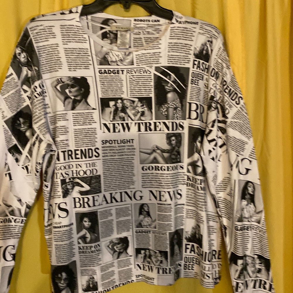 Women’s long sleeve shirt. Polyester. Gently worn.